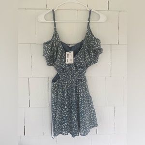 Abstract blue and white romper with cut out sides (WITH TAGS)